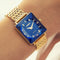 Swiss Made Square Womens Watch Facet Princess by Jowissa with blue sunray dial und blue glass, golden case and gold bracelet