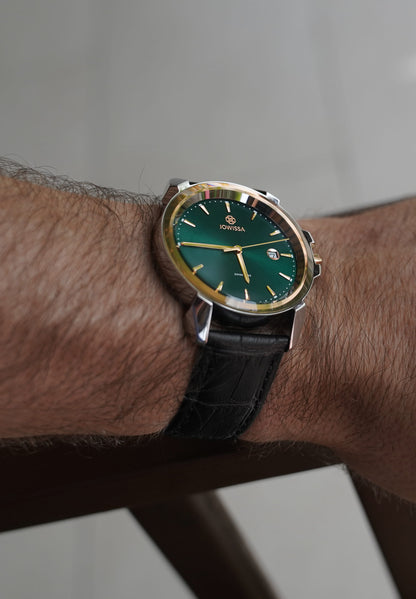 Green mens watch with black leather strap and green dial with gold details in the front - all swiss made watch