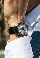 Load image into Gallery viewer, grey shiny swiss men watch. Modern and Classic watch due to the black leather strap and the functional dial witch functions like date display
